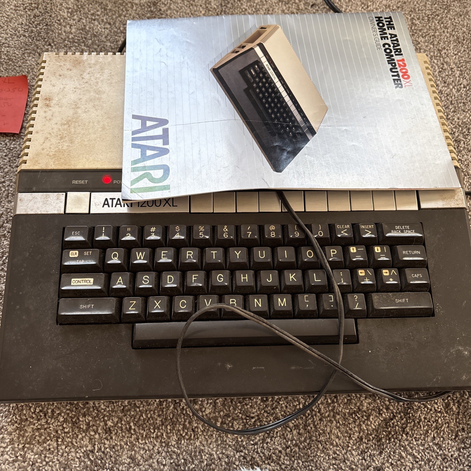 Vintage Atari 1200XL Home Computer Powers On, w owners guide and power supply Vintage Atari 1200XL Home Computer Powers On, w owners guide and power supply