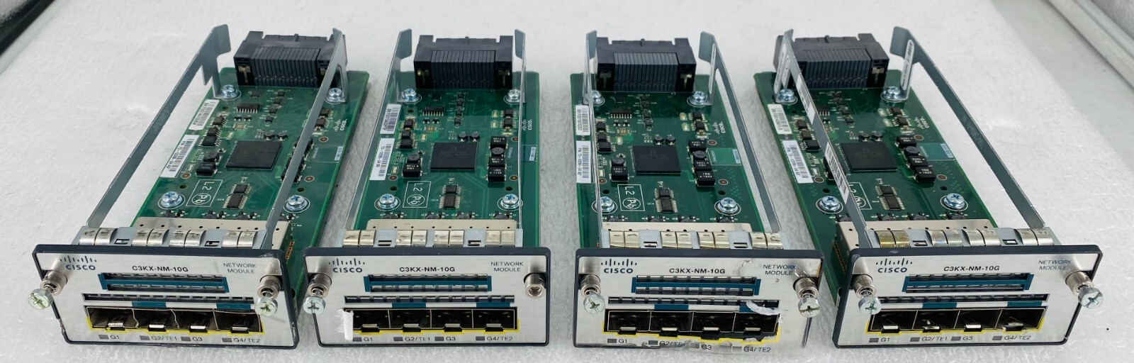LOT OF 4 CISCO C3KX-NM-10G SFP+ EXPANSION MODULES *SEE PICTURES*